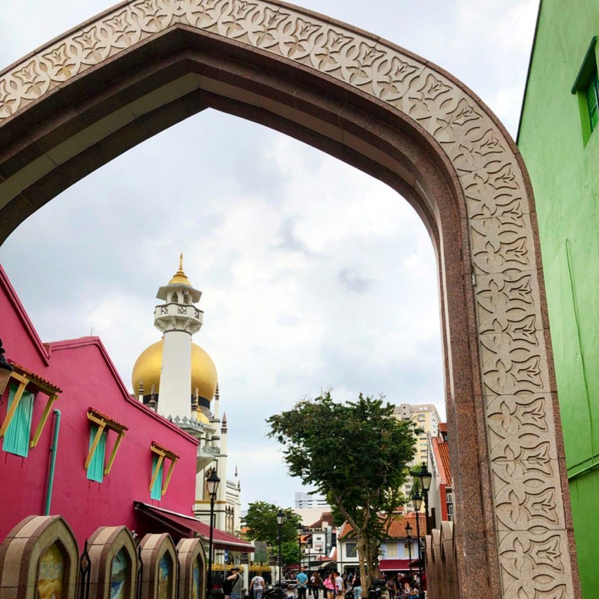 Sultan Mosque through ornate archway