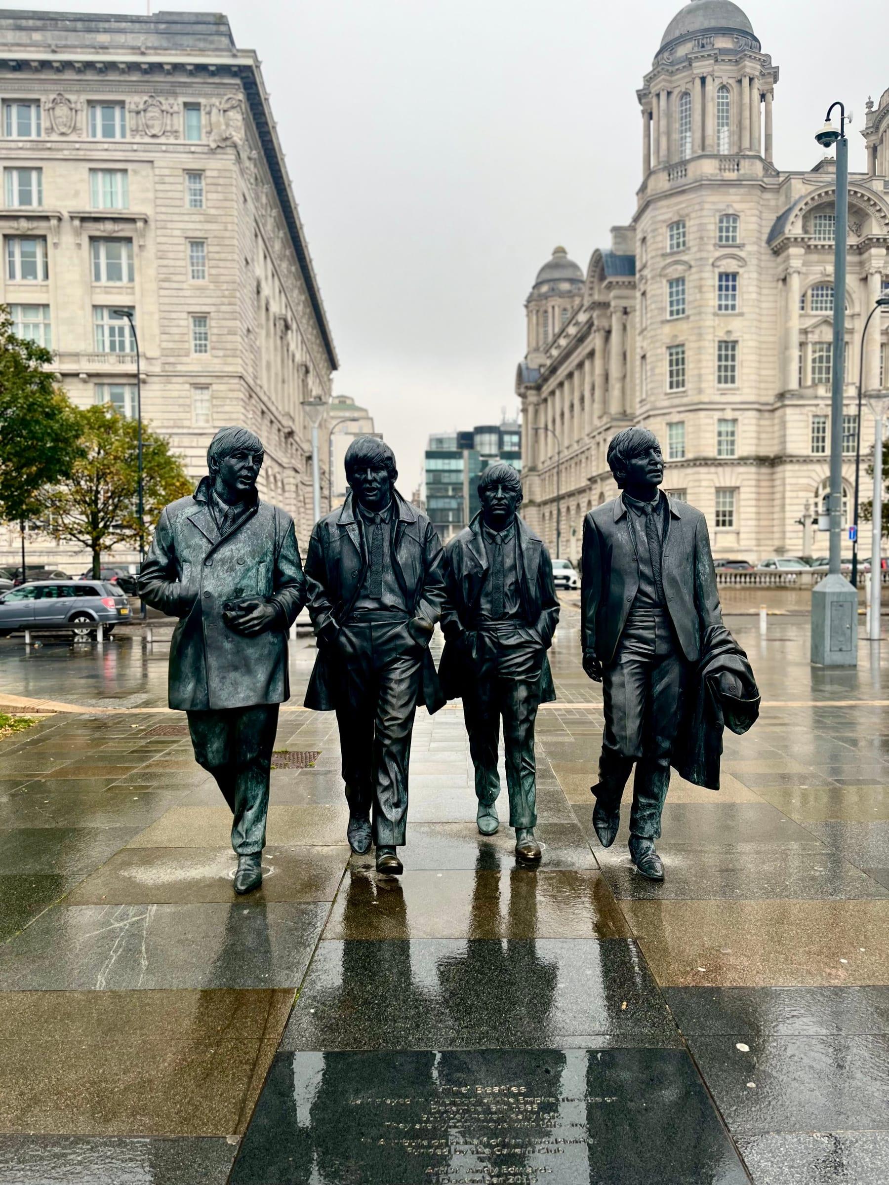 Beatles statue in rain